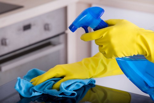 Cleaner checking a room for hazards before starting work